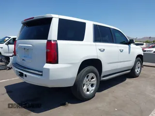 2015 Chevrolet Tahoe Commercial with VIN 1GNSK3EC9FR622941, listed as a IAAI auction lot 42592315 with 239,334 mi miles and . Bid and sale history available at DreamBid. Image 4.