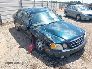 2004 Kia Optima LX z VIN KNAGD126745321016, wystawiony jako IAAI lot #41442758 z przebiegiem 117 949 mil mil oraz . Historia ofert i sprzedaży dostępna na DreamBid. Obrazek 1.
