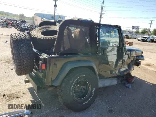 2004 Jeep Wrangler Sport with VIN 1J4FA49S04P751464, listed as a Copart auction lot 61686865 with Not provided miles and Salvage title. Bid and sale history available at DreamBid. Image 3.