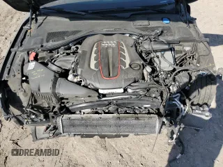 2016 Audi S7 z VIN WAUW2AFC8GN013150, wystawiony jako Copart lot #53048055 z przebiegiem 93 385 mil mil oraz Szkody całkowita. Historia ofert i sprzedaży dostępna na DreamBid. Obrazek 11.