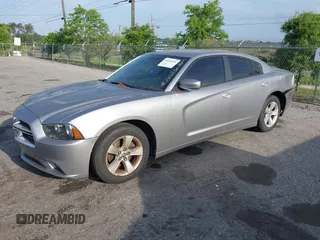 2014 Dodge Charger SE with VIN 2C3CDXBGXEH284832, listed as a IAAI auction lot 42069294 with 186,273 mi miles and . Bid and sale history available at carsss.com. Image 17.