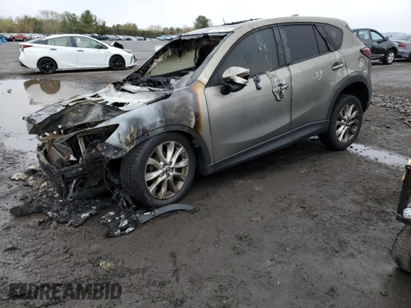 2015 Mazda CX-5 Grand Touring with VIN JM3KE4DY6F0528286, listed as a Copart auction lot 52367765 with Not Provided miles and Salvage Title. Bid and sale history available at DreamBid. Image 1.