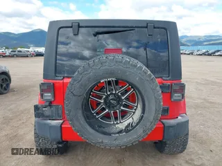 2018 Jeep Wrangler JK Unlimited Sahara with VIN 1C4HJWEG3JL893970, listed as a IAAI auction lot 39530074 with 72,079 mi miles. Bid and sale history available at carsss.com. Image 16.