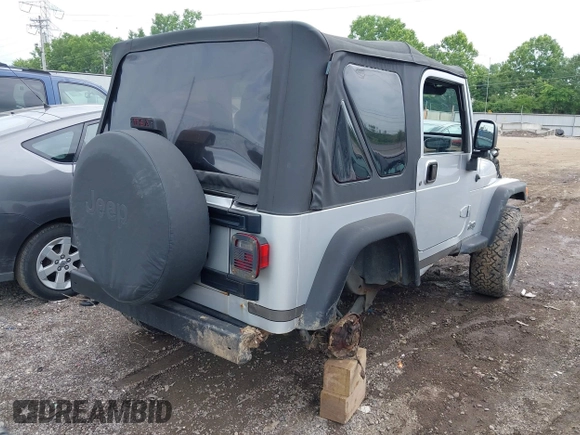 2004 Jeep Wrangler Sport with VIN 1J4FA49S44P772575, listed as a IAAI auction lot 42512876 with 226,387 mi miles and . Bid and sale history available at DreamBid. Image 4.