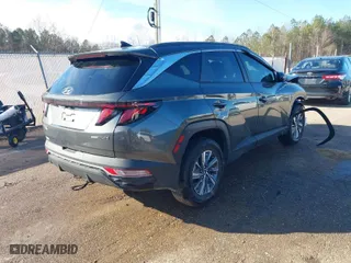 2024 Hyundai Tucson Hybrid Blue with VIN KM8JBCD11RU143446, listed as a IAAI auction lot 41305834 with 30,559 mi miles. Bid and sale history available at carsss.com. Image 4.
