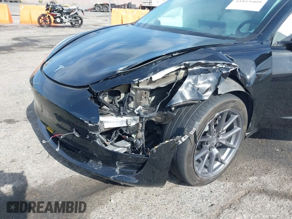 2022 Tesla Model 3 Long Range with VIN 5YJ3E1EB6NF233131, listed as a IAAI auction lot 41819409 with 38,308 mi miles and . Bid and sale history available at DreamBid. Image 6.