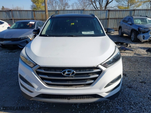 2017 Hyundai Tucson Value with VIN KM8J33A28HU533047, listed as a IAAI auction lot 41853087 with 74,238 mi miles. Bid and sale history available at carsss.com. Image 12.