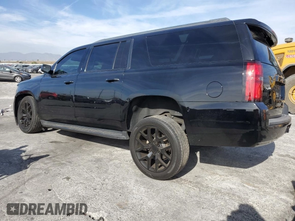 2018 Chevrolet Suburban LS with VIN 1GNSCGEC4JR383988, listed as a Copart auction lot 43199585 with 79,469 mi miles and Salvage title. Bid and sale history available at DreamBid. Image 2.