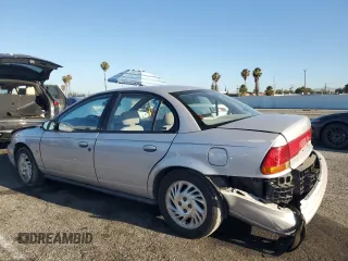 1999 Saturn SL with VIN 1G8ZK5274XZ367394, listed as a Copart auction lot 63863795 with 73,197 mi miles and Salvage title. Bid and sale history available at DreamBid. Image 2.