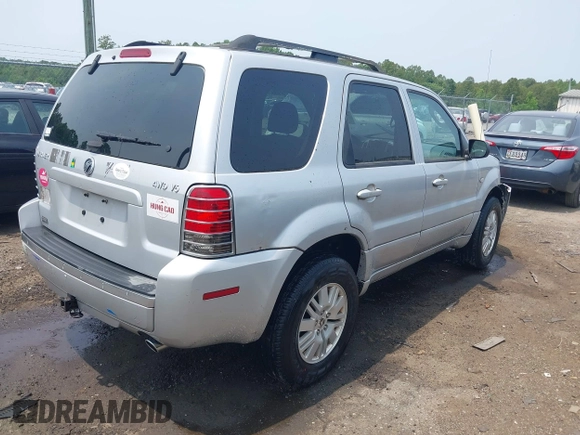 2005 Mercury Mariner Luxury z VIN 4M2CU57135DJ23718, wystawiony jako IAAI lot #42441869 z przebiegiem 179 378 mil mil oraz . Historia ofert i sprzedaży dostępna na DreamBid. Obrazek 4.