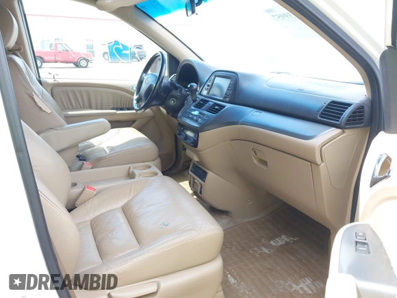 2007 Honda Odyssey EX-L with VIN 5FNRL38787B144585, listed as a IAAI auction lot 42139957 with 211,412 mi miles and . Bid and sale history available at DreamBid. Image 5.