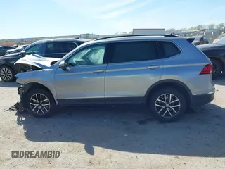 2021 Volkswagen Tiguan SE with VIN 3VV3B7AXXMM116774, listed as a IAAI auction lot 41868796 with Not Provided miles and . Bid and sale history available at DreamBid. Image 13.