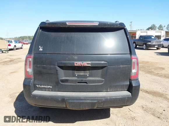 2015 GMC Yukon SLT z VIN 1GKS1BKC8FR112952, wystawiony jako IAAI lot #41836398 z przebiegiem 155 329 mil mil oraz . Historia ofert i sprzedaży dostępna na DreamBid. Obrazek 16.