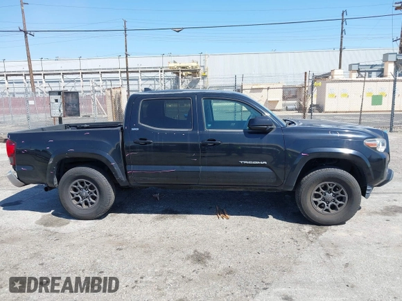 2018 Toyota Tacoma SR5 with VIN 3TMAZ5CN1JM061127, listed as a IAAI auction lot 42012247 with 119,381 mi miles and . Bid and sale history available at DreamBid. Image 13.