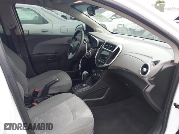 2018 Chevrolet Sonic LS with VIN 1G1JB5SHXJ4113116, listed as a IAAI auction lot 42450167 with 87,470 mi miles and . Bid and sale history available at DreamBid. Image 5.