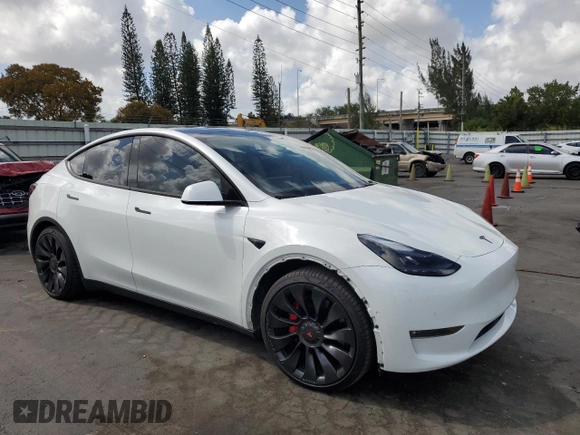 2022 Tesla Model Y Performance with VIN 7SAYGDEFXNF510418, listed as a Copart auction lot 51131465 with 16,263 mi miles and Salvage Title. Bid and sale history available at DreamBid. Image 4.