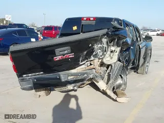 2015 GMC Sierra 1500 Denali with VIN 3GTU2WEC7FG204610, listed as a IAAI auction lot 41730939 with 130,620 mi miles. Bid and sale history available at carsss.com. Image 4.