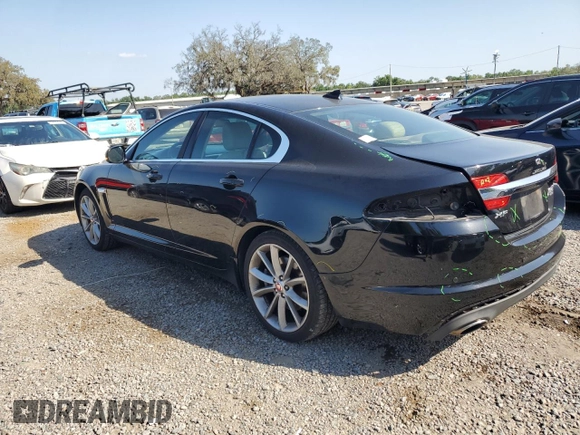 2015 Jaguar XF V6 Portfolio with VIN SAJWJ0FFXF8U60040, listed as a Copart auction lot 52912695 with 112,618 mi miles and Salvage Title. Bid and sale history available at carsss.com. Image 2.