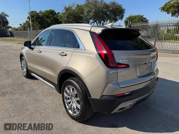 2023 Cadillac XT4 AWD Premium Luxury z VIN 1GYFZDR40PF108407, wystawiony jako Copart lot #86400754 z przebiegiem 8 724 mil mil oraz Nie do naprawy • Non repairable. Historia ofert i sprzedaży dostępna na DreamBid. Obrazek 2.