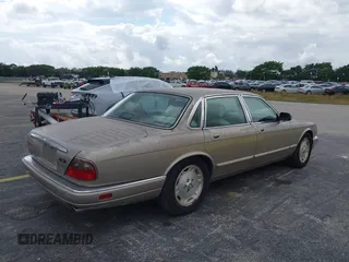1997 Jaguar XJ with VIN SAJHX1243VC811786, listed as a IAAI auction lot 41451521 with Not provided miles and . Bid and sale history available at DreamBid. Image 4.