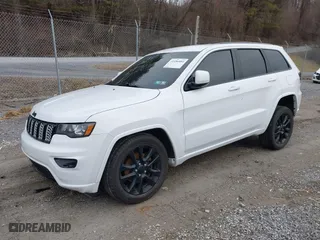 2018 Jeep Grand Cherokee Laredo E with VIN 1C4RJFAG6JC152867, listed as a IAAI auction lot 41486884 with 67,115 mi miles. Bid and sale history available at carsss.com. Image 2.