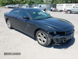 2015 Dodge Charger SE with VIN 2C3CDXBG9FH790573, listed as a IAAI auction lot 42142908 with 195,182 mi miles and . Bid and sale history available at carsss.com. Image 1.