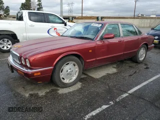 1996 Jaguar XJ with VIN SAJHX1740TC771088, listed as a Copart auction lot 46741735 with 86,424 mi miles and Clean title. Bid and sale history available at DreamBid. Image 1.