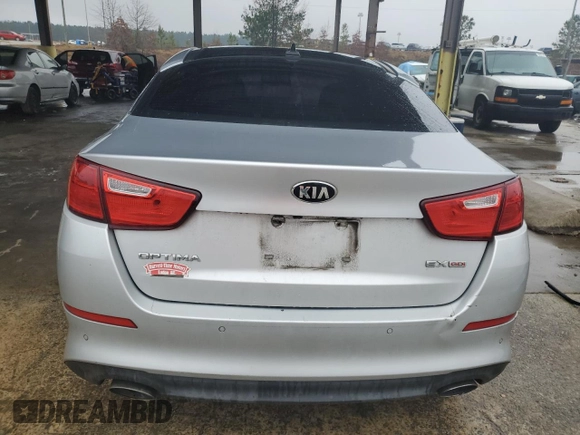 2015 Kia Optima EX with VIN 5XXGN4A73FG447349, listed as a Copart auction lot 89400895 with 235,069 mi miles and Salvage Title. Bid and sale history available at carsss.com. Image 6.