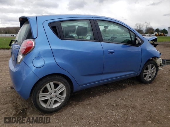 2015 Chevrolet Spark LS with VIN KL8CB6S99FC709189, listed as a Copart auction lot 53327905 with 80,481 mi miles and Salvage Title. Bid and sale history available at DreamBid. Image 3.