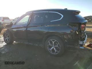 2018 BMW X1 xDrive28i with VIN WBXHT3C37J3H32374, listed as a Copart auction lot 70226702 with 65,796 mi miles. Bid and sale history available at carsss.com. Image 2.