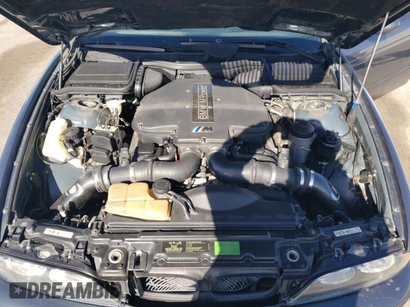 2000 BMW M5 z VIN WBSDE9349YBZ94615, wystawiony jako Copart lot #88802245 z przebiegiem 157 774 mil mil oraz Tytuł czysty. Historia ofert i sprzedaży dostępna na DreamBid. Obrazek 11.