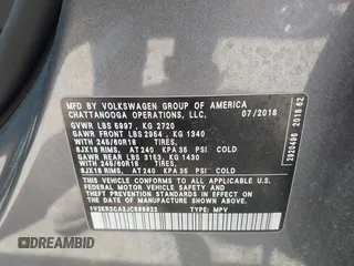 2018 Volkswagen Atlas SE with VIN 1V2KR2CA2JC585922, listed as a IAAI auction lot 42488658 with 105,878 mi miles and . Bid and sale history available at DreamBid. Image 9.