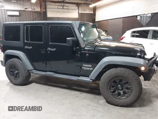 2015 Jeep Wrangler Unlimited Willys Wheeler with VIN 1C4BJWDG1FL749803, listed as a IAAI auction lot 41995132 with 156,595 mi miles and . Bid and sale history available at DreamBid. Image 14.