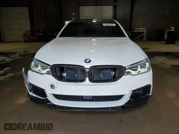 2018 BMW 5 Series M550i xDrive with VIN WBAJB9C5XJB035514, listed as a Copart auction lot 50045425 with 76,325 mi miles and Salvage Title. Bid and sale history available at carsss.com. Image 5.