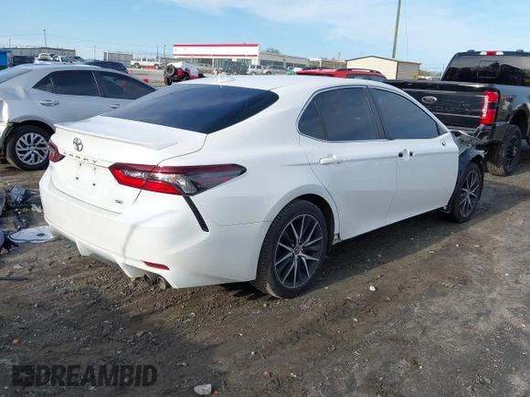 2022 Toyota Camry SE with VIN 4T1G11AK4NU620329, listed as a IAAI auction lot 41582065 with 50,000 mi miles and . Bid and sale history available at carsss.com. Image 4.