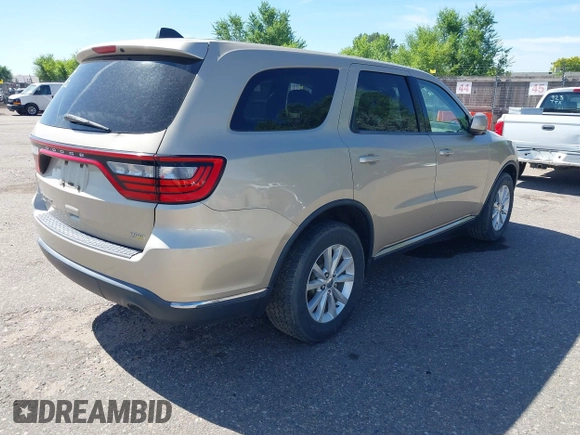 2014 Dodge Durango SXT with VIN 1C4RDJAG0EC455787, listed as a IAAI auction lot 42651627 with 103,218 mi miles and . Bid and sale history available at DreamBid. Image 4.