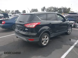 2013 Ford Escape SE with VIN 1FMCU0GX8DUC47099, listed as a IAAI auction lot 42573987 with 142,779 mi miles and . Bid and sale history available at DreamBid. Image 4.