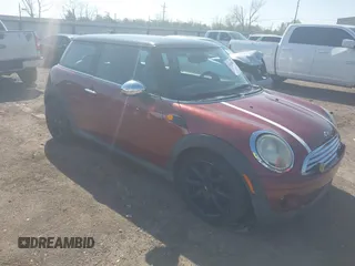 2009 MINI Hardtop with VIN WMWMF335X9TW71368, listed as a IAAI auction lot 41965885 with 165,744 mi miles and . Bid and sale history available at DreamBid. Image 1.