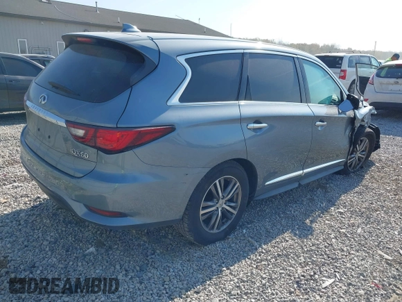 2019 Infiniti QX60 LUXE with VIN 5N1DL0MNXKC569949, listed as a IAAI auction lot 40704078 with 117,592 mi miles. Bid and sale history available at carsss.com. Image 4.
