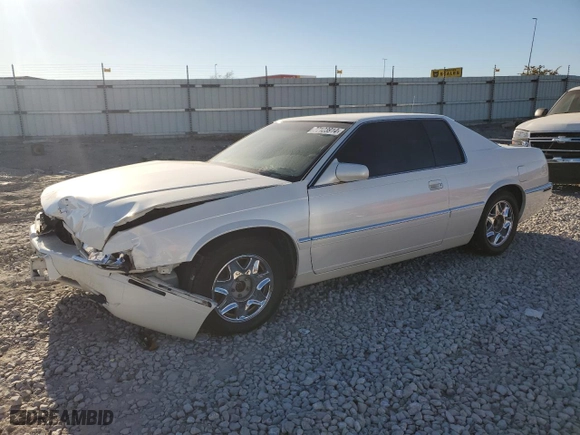 2000 Cadillac Eldorado with VIN 1G6EL12Y5YU176121, listed as a Copart auction lot 77123914 with 91,663 mi miles and Salvage Title. Bid and sale history available at carsss.com. Image 1.