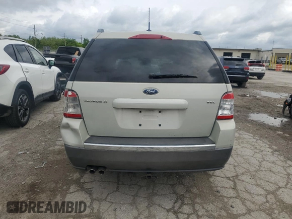 2008 Ford Taurus X SEL z VIN 1FMDK02W58GA14293, wystawiony jako Copart lot #57664585 z przebiegiem 145 529 mil mil oraz Szkoda całkowita • Salvage title. Historia ofert i sprzedaży dostępna na DreamBid. Obrazek 6.