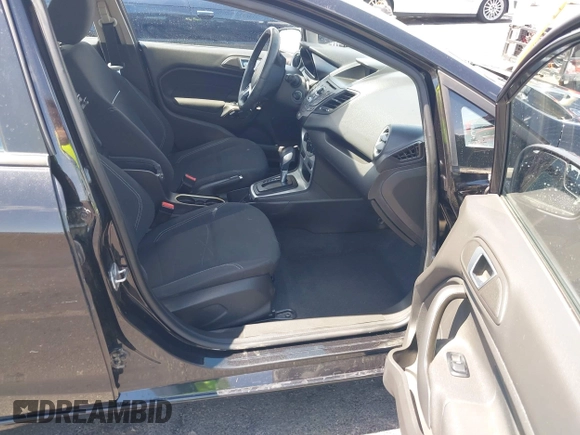 2014 Ford Fiesta SE with VIN 3FADP4BJ1EM204083, listed as a IAAI auction lot 42149088 with 136,209 mi miles and . Bid and sale history available at DreamBid. Image 5.