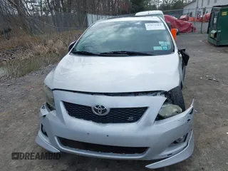 2009 Toyota Corolla with VIN 2T1BU40E69C123823, listed as a IAAI auction lot 42079964 with 204,124 mi miles. Bid and sale history available at carsss.com. Image 12.