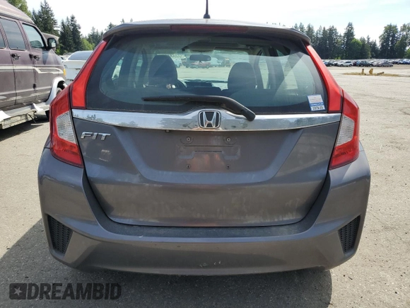 2015 Honda Fit EX-L with VIN 3HGGK5H80FM767970, listed as a Copart auction lot 55866075 with 64,435 mi miles and Salvage Title. Bid and sale history available at DreamBid. Image 6.
