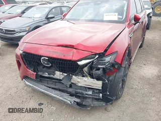2024 Mazda CX-90 S z VIN JM3KK1HC2R1133087, wystawiony jako IAAI lot #41955750 z przebiegiem 24 217 mil mil oraz . Historia ofert i sprzedaży dostępna na DreamBid. Obrazek 6.