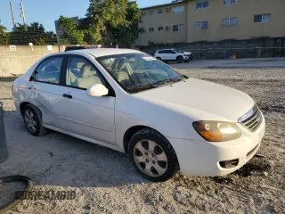 2009 Kia Spectra EX with VIN KNAFE221195630944, listed as a Copart auction lot 42291345 with 83,269 mi miles and Salvage Title. Bid and sale history available at DreamBid. Image 4.
