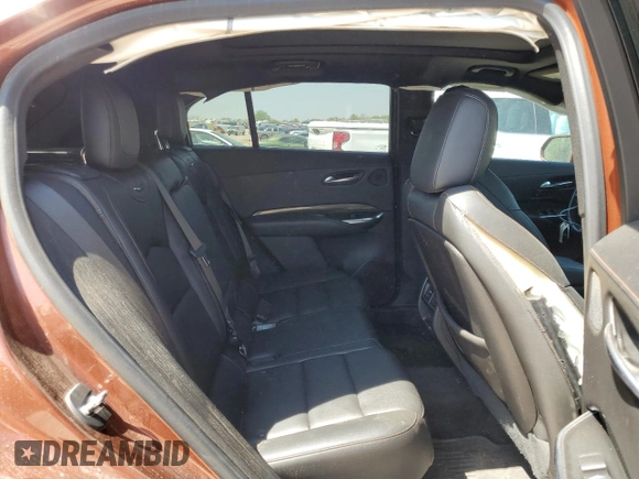 2019 Cadillac XT4 AWD Sport with VIN 1GYFZFR42KF136567, listed as a Copart auction lot 52018445 with 99,944 mi miles and Salvage title. Bid and sale history available at DreamBid. Image 11.