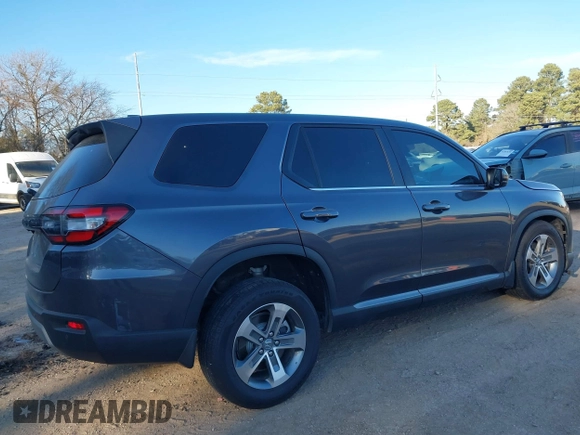 2023 Honda Pilot EX-L with VIN 5FNYG1H5XPB044829, listed as a IAAI auction lot 41396208 with 15,277 mi miles and . Bid and sale history available at DreamBid. Image 4.
