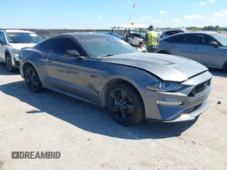 2023 Ford Mustang GT with VIN 1FA6P8CF4P5303774, listed as a IAAI auction lot 40209486 with 16,438 mi miles and . Bid and sale history available at DreamBid. Image 1.