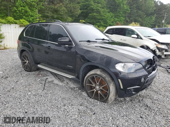 2013 BMW X5 xDrive50i with VIN 5UXZV8C55DL899584, listed as a Copart auction lot 54257745 with 111,367 mi miles and Clean title. Bid and sale history available at DreamBid. Image 4.